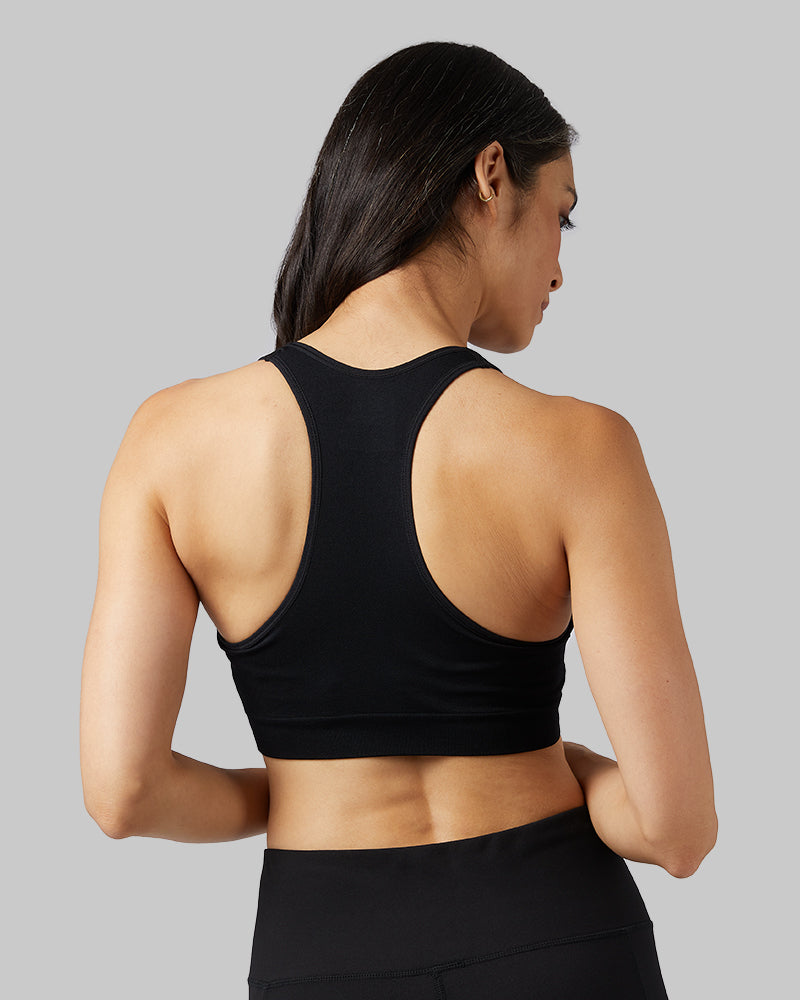 32 Degrees Black _ Women's Seamless Racerback Sports Bra {model:Mariana is 5'8" and size 4, wearing size S}{bottom}{right}