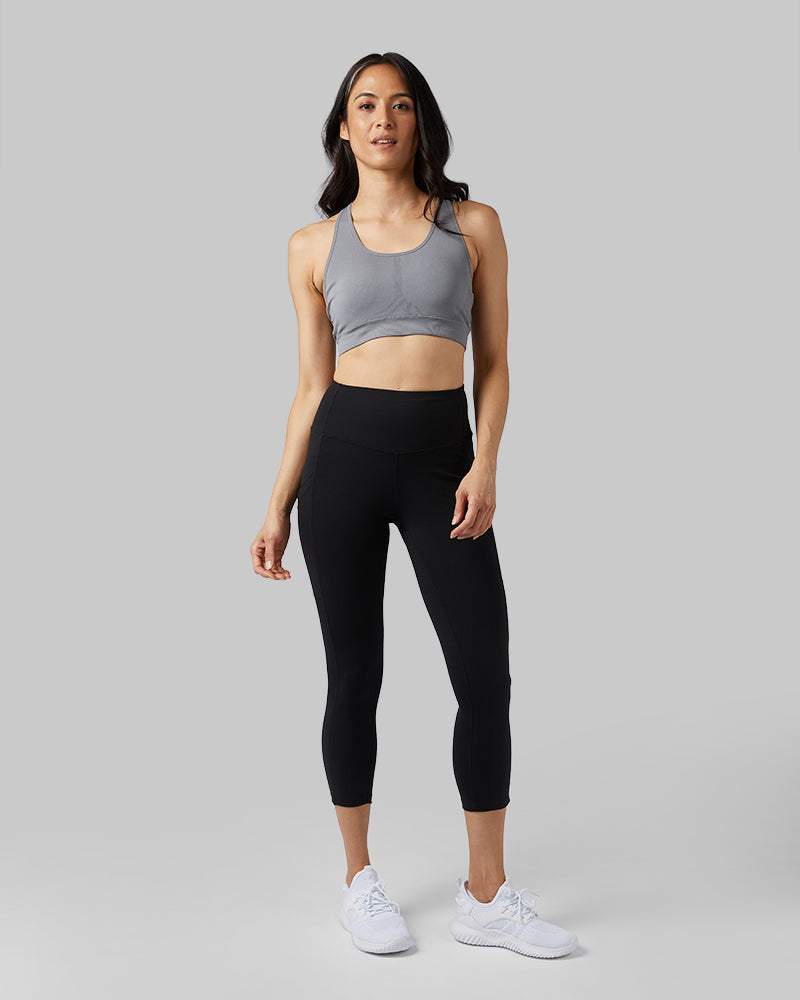 32 Degrees Steel Grey _ Women's Seamless Racerback Sports Bra {model:Mariana is 5'8" and size 4, wearing size S}{bottom}{right}