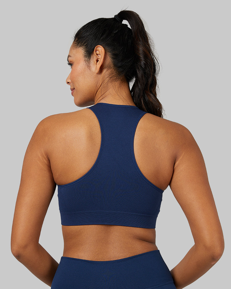 32 Degrees Inky Indigo _ Women's Seamless Racerback Sports Bra {model: Victoria is 5'10" and size 4-6, wearing size S}{bottom}{right} {bottom}{right}
