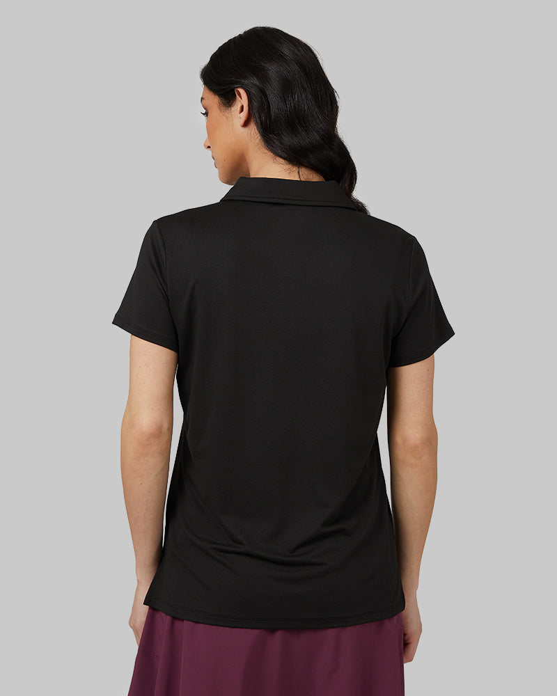 32 Degrees Black _ Womens Cool Fitted Polo {model: Rowena is 5'8" and size 4, wearing size S}{bottom}{right} {bottom}{right}