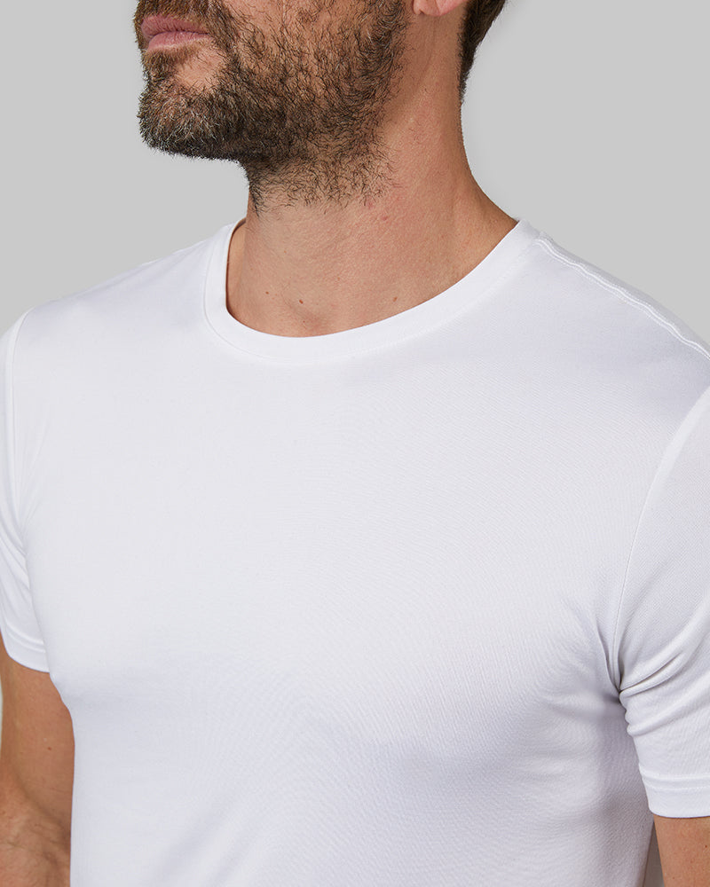32 Degrees White _ Men's 4PK Cool Crew Neck Tee {model: Cedric is 6'1.5", wearing size M}{bottom}{right}{bottom}{right}