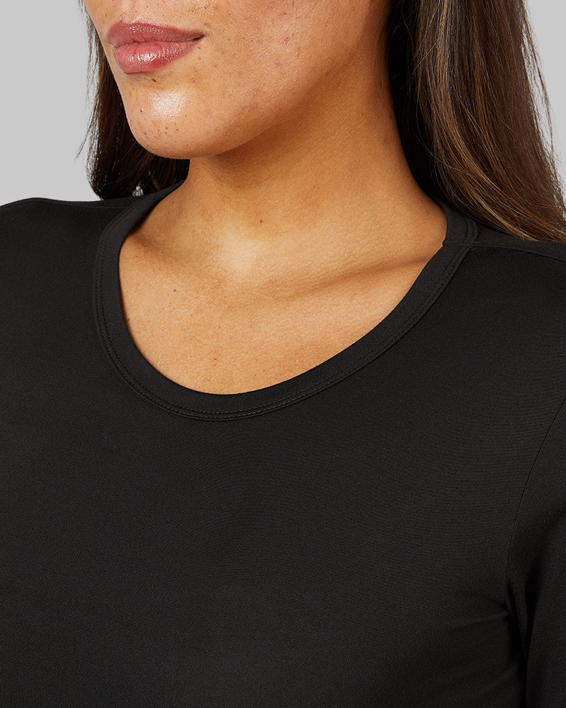 32 Degrees Black _ Women's Lightweight Baselayer Crew Top {model: Shelby is 5'9"and size 4 wearing size S}{bottom}{right} {bottom}{right}