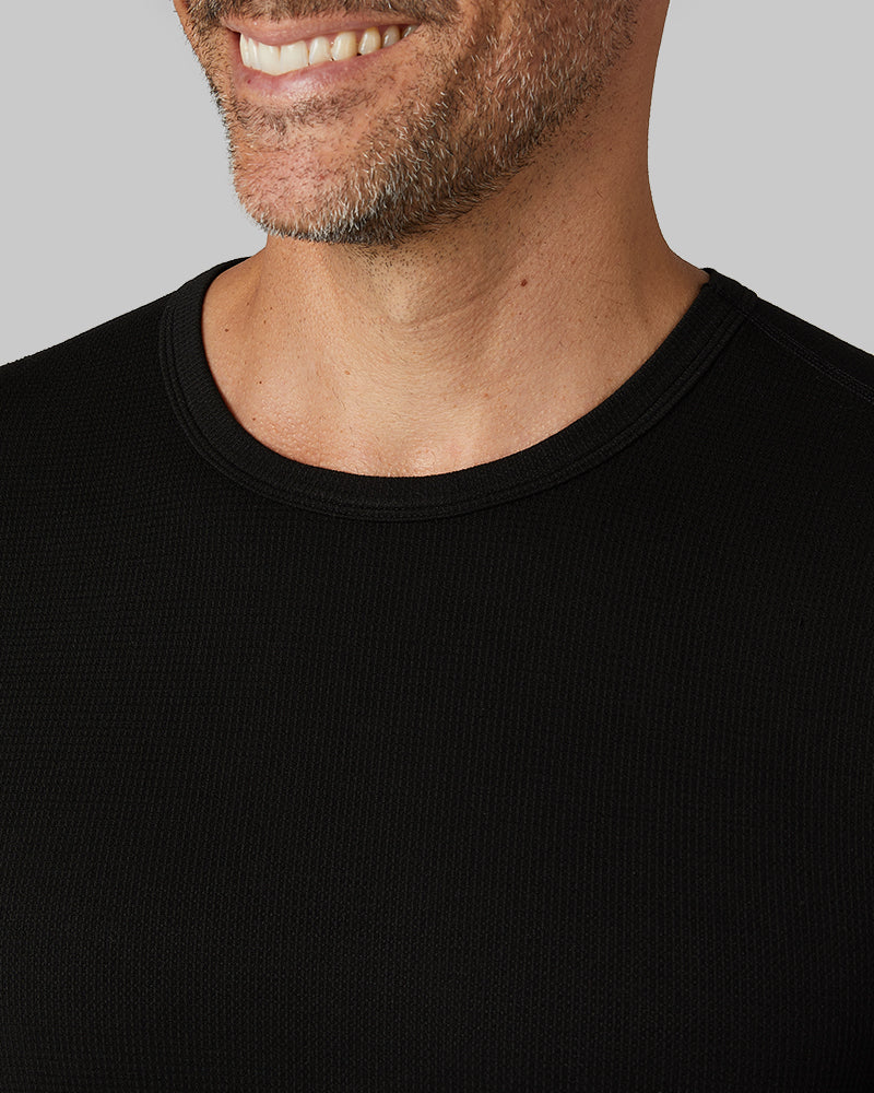 32 Degrees Black _ Men's Midweight Baselayer Crew Top {model: Eduardo is 6'1", wearing size M}{bottom}{right} {bottom}{right}