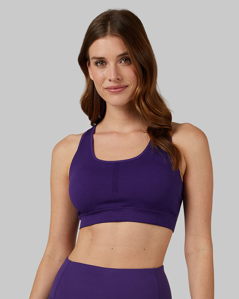 32 Degrees Celestial Purple _ Women's Seamless Racerback Sports Bra {model: Lara is 5'9"and size 4, wearing size S}{bottom}{right} {bottom}{right}