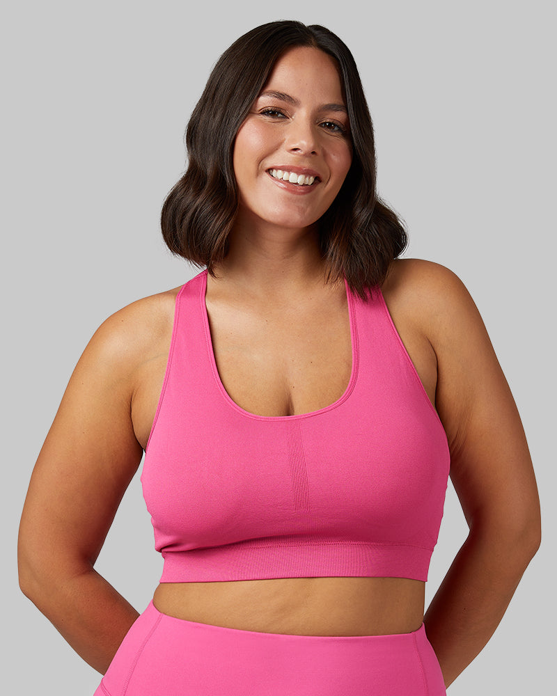 32 Degrees Raspberry Rose _ Women's Seamless Racerback Sports Bra {model: Maya is 5'7"and size 12, wearing size L}{bottom}{right} {bottom}{right}