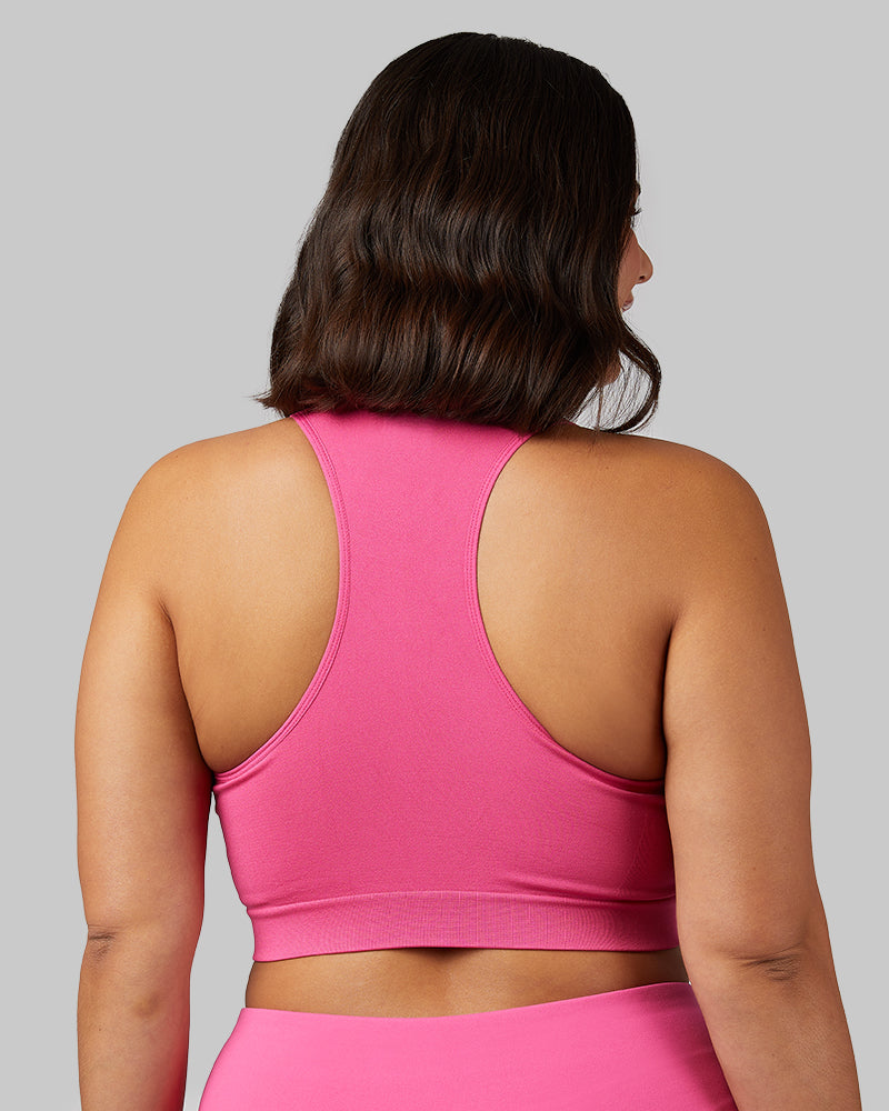32 Degrees Raspberry Rose _ Women's Seamless Racerback Sports Bra {model: Maya is 5'7"and size 12, wearing size L}{bottom}{right} {bottom}{right}