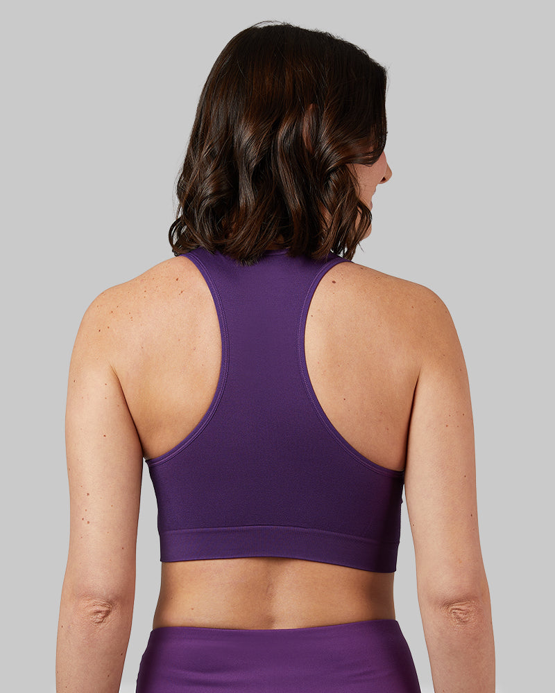 32 Degrees Imperial Purple _ Women's seamless Racerback sports Bra {model: Debora is 5'9"and size 4 wearing size S}{bottom}{right} {bottom}{right}