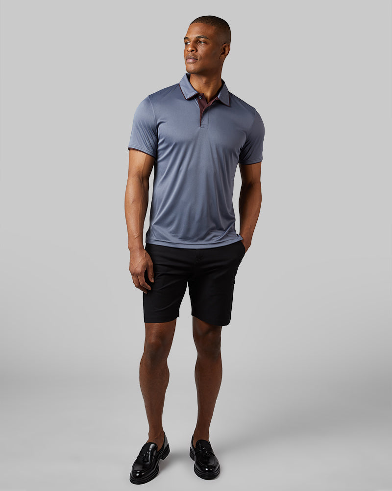 32 Degrees Dim Blue _ Men's stretch Flow Tipped Polo {model: Isaiah is 6'1", wearing size M}{bottom}{right} {bottom}{right}