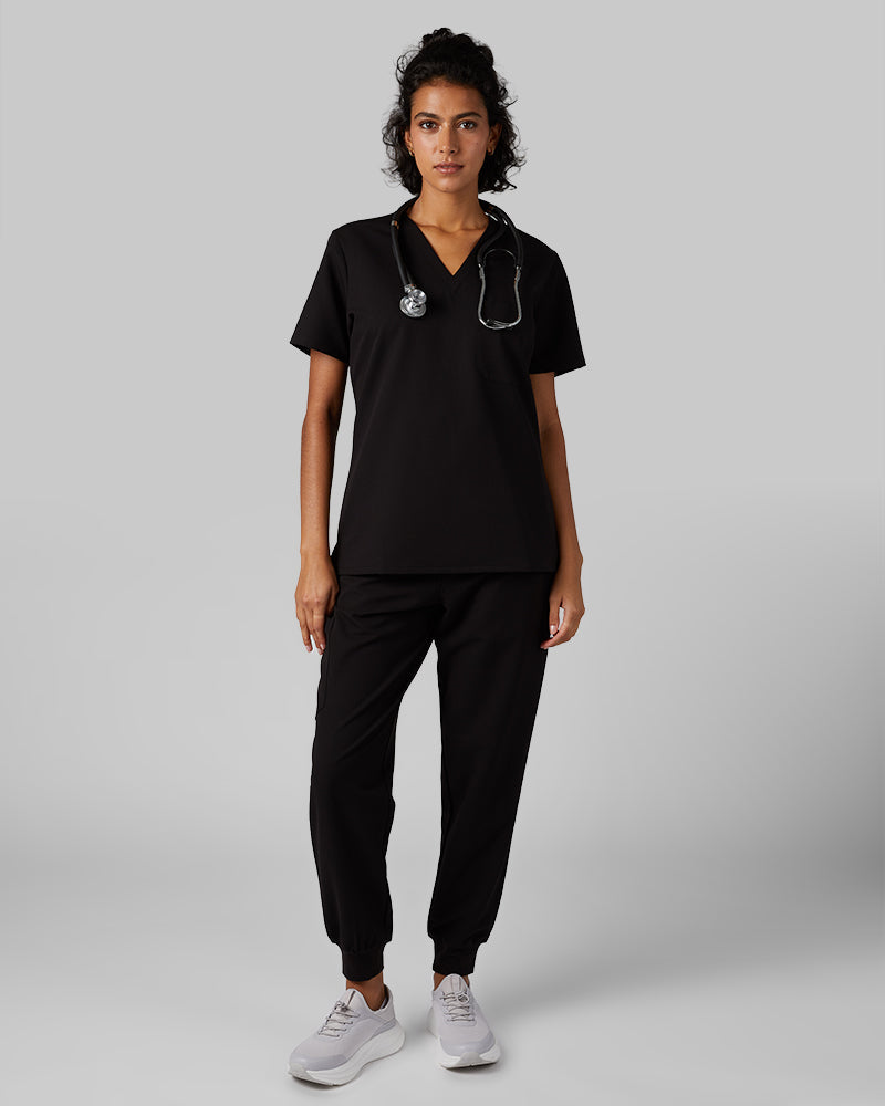 32 Degrees Black _ Womens 1-Pocket V-Neck scrub Top {model: Arantza is 5'9"and size 2 wearing size XS}{bottom}{right} {bottom}{right}