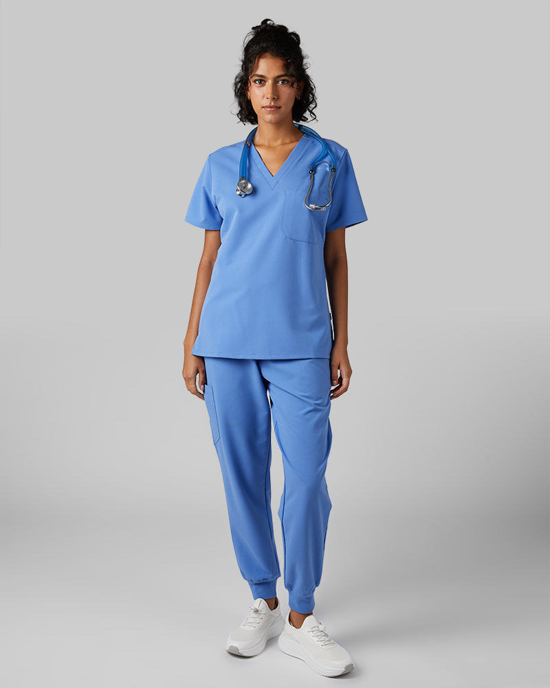 32 Degrees Blue Sky _ Womens 1-Pocket V-Neck scrub Top {model: Arantza is 5'9"and size 2 wearing size XS}{bottom}{right} {bottom}{right}