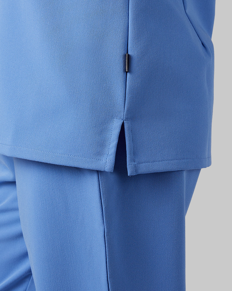 32 Degrees Blue Sky _ Womens 1-Pocket V-Neck scrub Top {model: Arantza is 5'9"and size 2 wearing size XS}{bottom}{right} {bottom}{right}