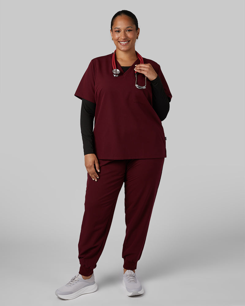 32 Degrees Burgundy _ Womens 1-Pocket V-Neck scrub Top {model: Madison is 5'9and size 16 wearing size XL}{bottom}{right} {bottom}{right}