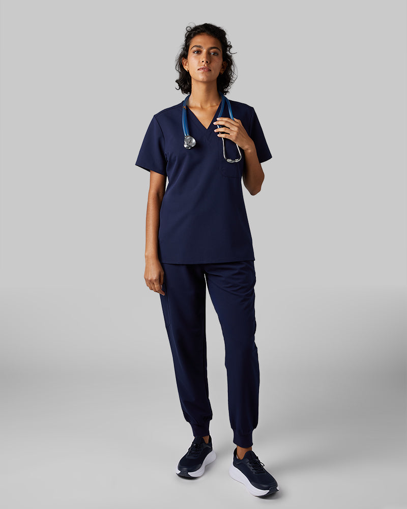 32 Degrees Navy _ Womens 1-Pocket V-Neck scrub Top {model: Arantza is 5'9"and size 2 wearing size XS}{bottom}{right} {bottom}{right}