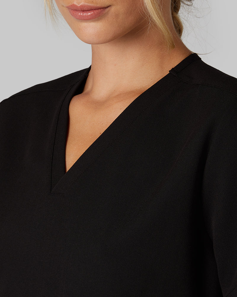 32 Degrees Black _ Women's 2-Pocket V-Neck scrub Top {model: Colby is 5'9"and size 4 wearing size S}{bottom}{right} {bottom}{right}