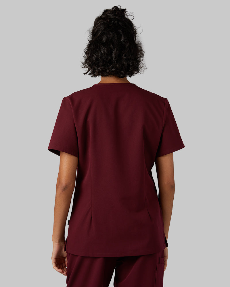 32 Degrees Burgundy _ Women's 2-Pocket V-Neck scrub Top {model: Arantza is 5'9"and size 2 wearing size XS}{bottom}{right} {bottom}{right}