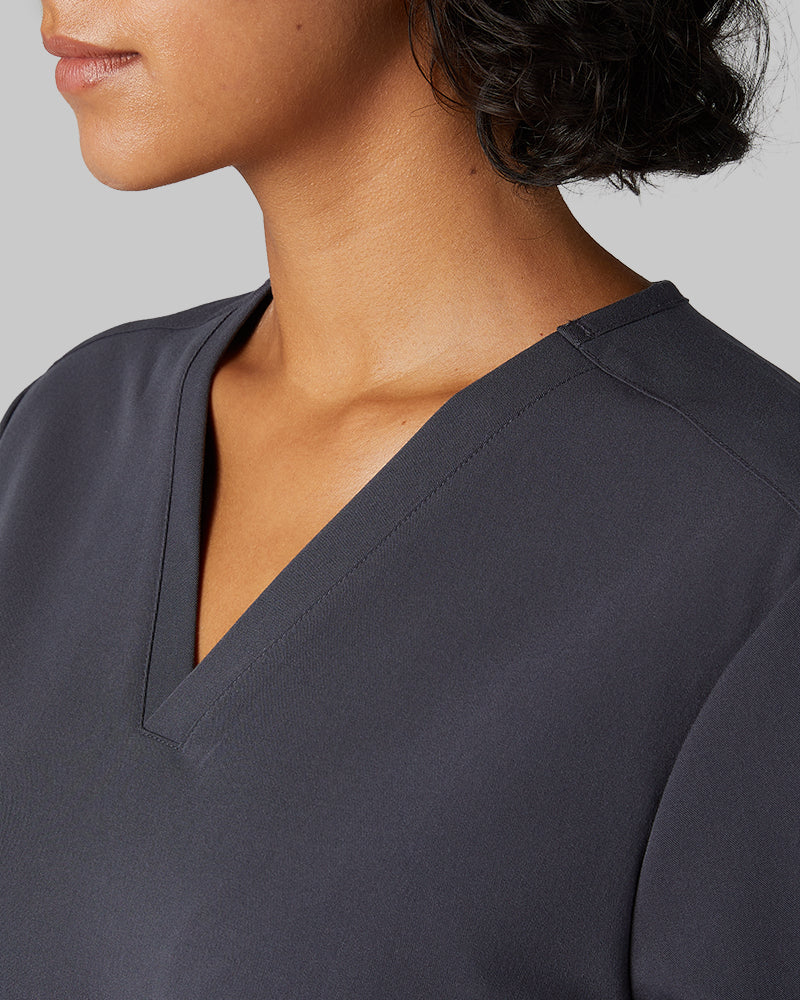 32 Degrees Charcoal _ Women's 2-Pocket V-Neck scrub Top {model: Arantza is 5'9"and size 2 wearing size XS}{bottom}{right} {bottom}{right}