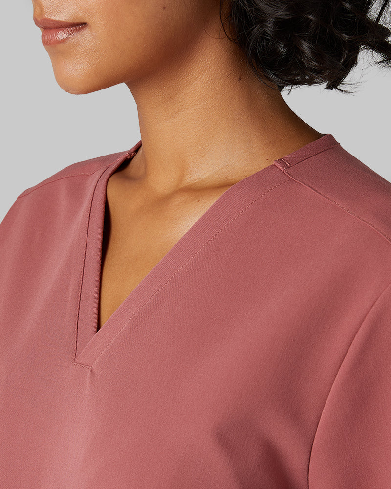32 Degrees Mauve _ Women's 2-Pocket V-Neck scrub Top {model: Arantza is 5'9"and size 2 wearing size XS}{bottom}{right} {bottom}{right}