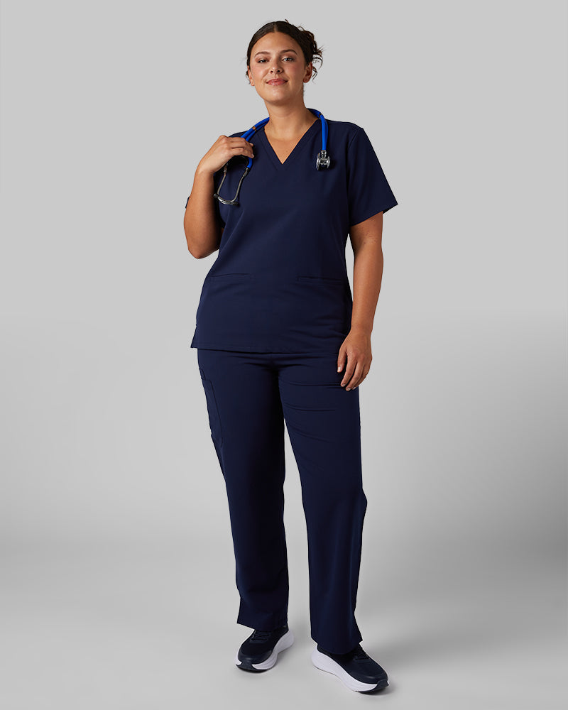 32 Degrees Navy _ Women's 2-Pocket V-Neck scrub Top {model: Hannah is 5'10and size 14 wearing size L}{bottom}{right} {bottom}{right}