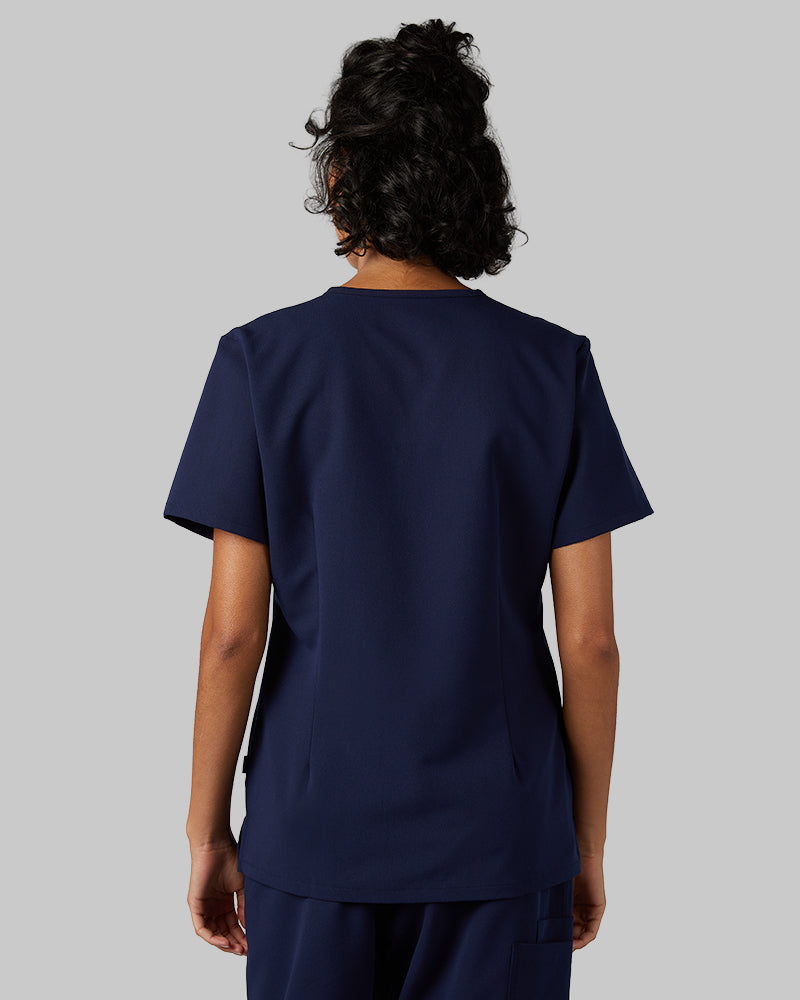 32 Degrees Navy _ Women's 2-Pocket V-Neck scrub Top {model: Arantza is 5'9"and size 2 wearing size XS}{bottom}{right} {bottom}{right}
