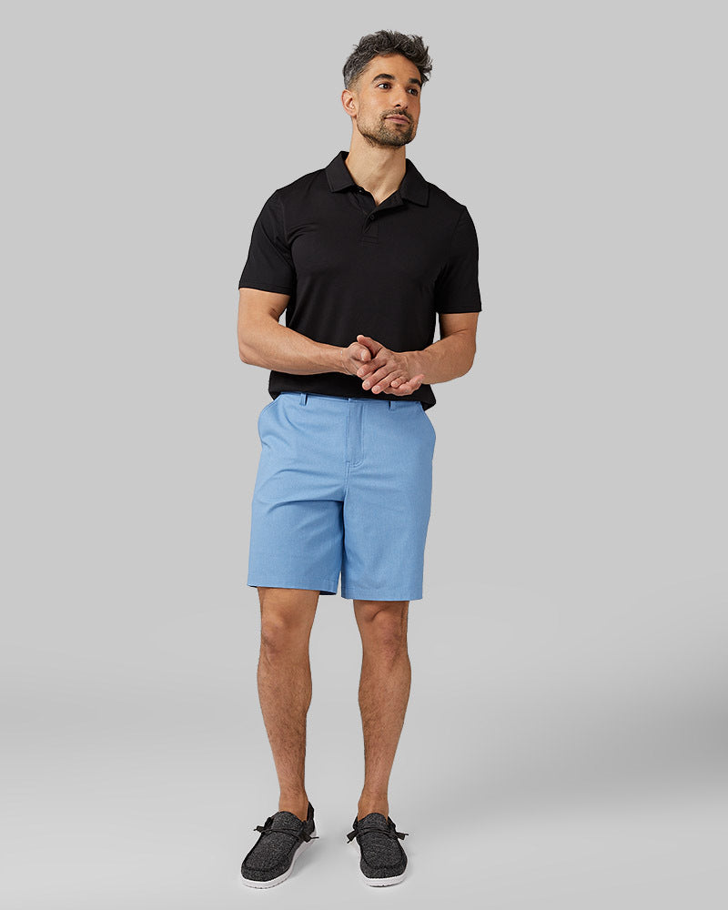 32 Degrees Black _ Men's Cool Classic Polo {model: Daniel is 6'2", wearing size M}{bottom}{right}