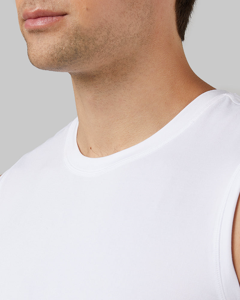 32 Degrees White _ Men's Cool Relaxed Tank {model: Zac is 6'3", wearing size M}{bottom}{right} {bottom}{right}
