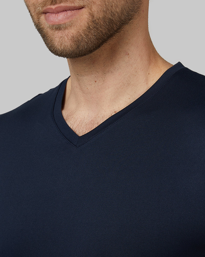 32 Degrees Navy_ Men's Cool Vneck T-Shirt {model:Kacey is 6'2", wearing size M}{bottom}{right}