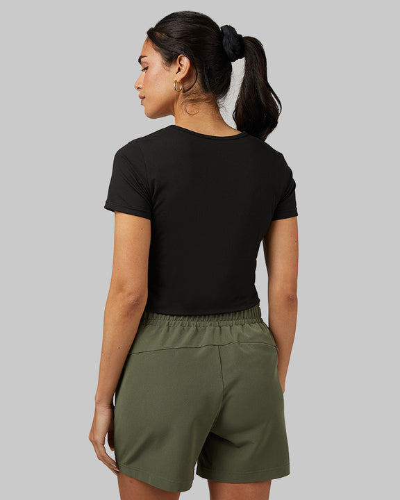 32 Degrees Black _ Women's Cool Fitted T-Shirt {model: Dani is 5'9" and size 2-4, wearing size S}{bottom}{right} {bottom}{right}