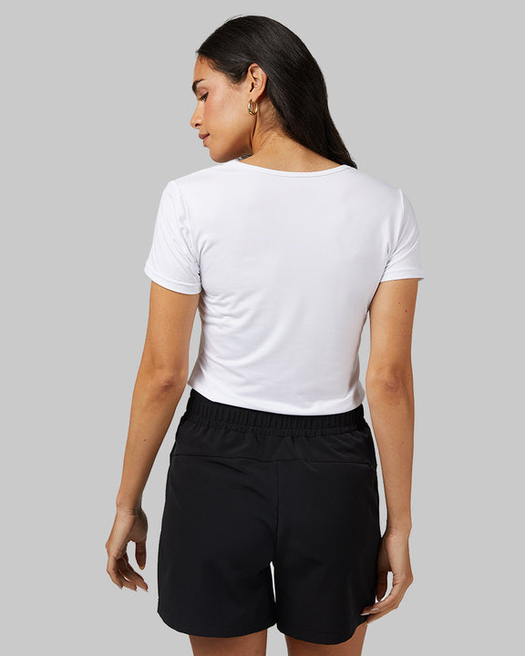 32 Degrees White _ Women's Cool Fitted T-Shirt {model: Dani is 5'9" and size 2-4, wearing size S}{bottom}{right} {bottom}{right}